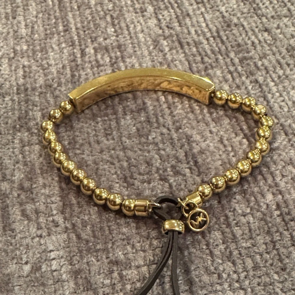 Michael Kors elegant gold